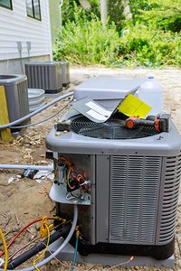 Manasquan air conditioner repair being done on a condenser